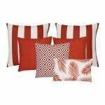 A set of 6 outdoor cushions in red colours and striped, plain, geometric and botanical designs.