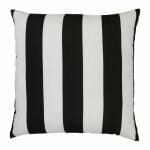 A top down view of an outdoor floor cushion that is black and white in colour and has stripes on one side and a plain colour on the other.