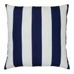 A top down view of an outdoor floor cushion that is navy in colour and has stripes on one side and a plain colour on the other.