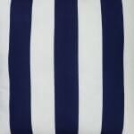 A close up view an outdoor floor cushion that is navy in colour and has stripes on one side and a plain colour on the other.