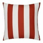 A large outdoor cushion that has a red striped pattern and is UV resistant and waterproof.