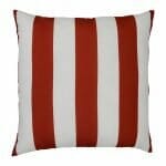 A top down view of an outdoor floor cushion that is red in colour and has stripes on one side and a plain colour on the other.