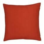A waterproof outdoor cushion cover that is red solid colour on both sides.
