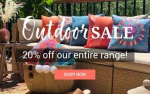 Outdoor sale. Outdoor cushions shown on an outdoor sofa.