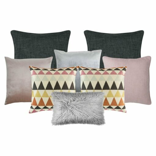 A photo of a set of 8 cushion covers in grey, pink and charcoal colours with a scandi design feel.