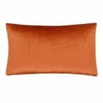 Photo of rectangular rust orange cushion cover in velvet linen material