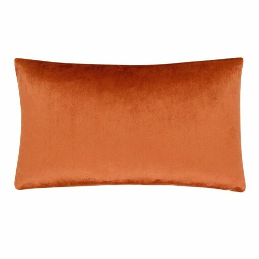 Photo of rectangular rust orange cushion cover in velvet linen material