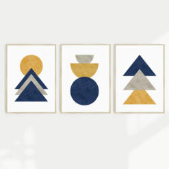 A set of 3 wall art prints featuring in Scandi geometric designs in navy, grey and fawn colours