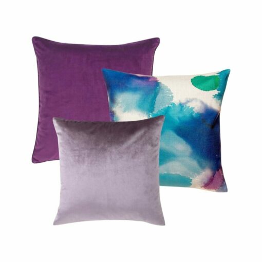 A collection of 3 square cushion covers in lavender, plum and blue colours.