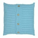Cute teal coloured knitted cushion cover with buttons