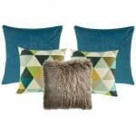A collection of five cushion covers in blue, green and brown colours with a scandi design feel.
