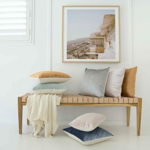 Stacks of beautiful cushions also great for beach theme colours