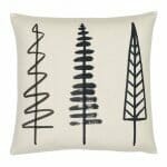 A photo of cotton linen blend cushion with minimalist black and white pine trees