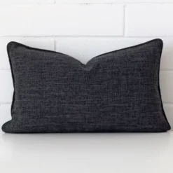 Vibrant charcoal cushion cover constructed from linen fabric and shown in a rectangle size.