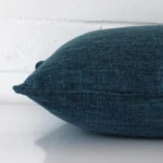 A square linen cushion positioned flat to show its seams. The cobalt blue colour is shown more clearly.