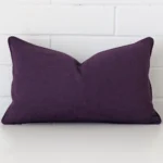 Vibrant plum cushion cover constructed from linen fabric and shown in a rectangle size.