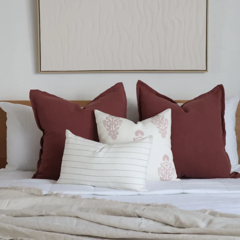 4 stylish cushions from the Luka bed set are neatly placed on the bed, bringing a beautiful touch to the room.