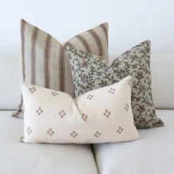 A closer shot image of the Amaro designer set of 3 bed cushions.