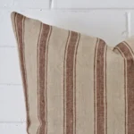 Enlarged shot of a large cushion cover that highlights that striped motif on its designer fabric.