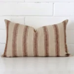 A graceful rectangle cushion with a striped style on durable designer fabric.