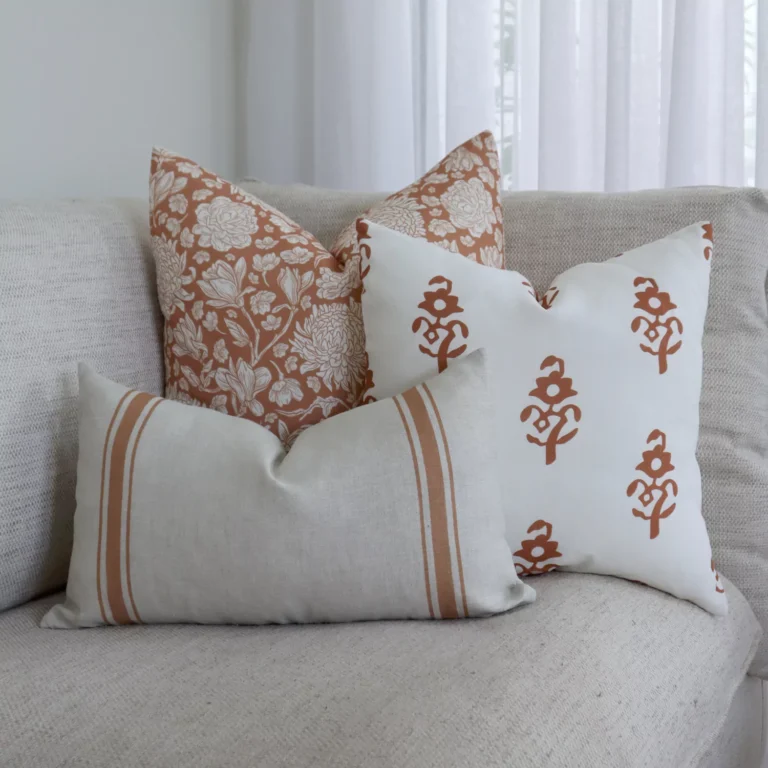 3 couch cushions from the Luka set are arranged in the corner of an elegant sofa.