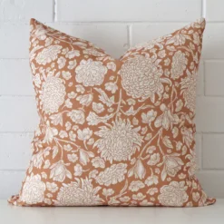 A superior linen terracotta cushion cover yielding a floral style and in a classy square size.