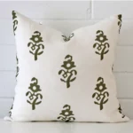 An alluring linen square cushion cover in olive green. It features an attractive patterned style.