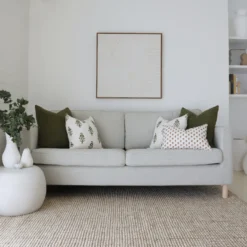 The grey sofa gets a stylish boost from the 5 carefully chosen cushions of the Ava sofa cushion set.