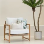 The Avena outdoor cushions set is displayed on an armchair.