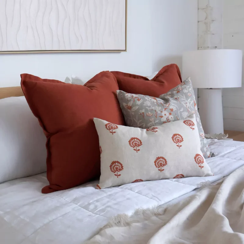 A side-view image of the set of 4 Avery bed cushions.