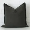 A graceful large moss green cushion that is made from a linen fabric.