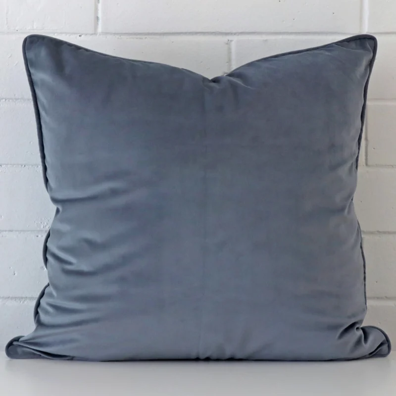 blue-grey-velvet-cushion-cover-55cm-x-55cm-sc432-55b Here a blue grey velvet cushion is shown styled against a white wall. It has a large size.