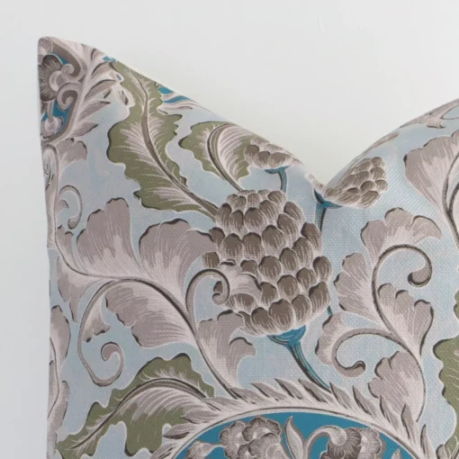 A macro image of the top left corner of this linen cushion, revealing the finer details of the square-shaped corner and its colours.