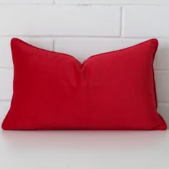 Vibrant red cushion cover constructed from velvet fabric and shown in a rectangle size.