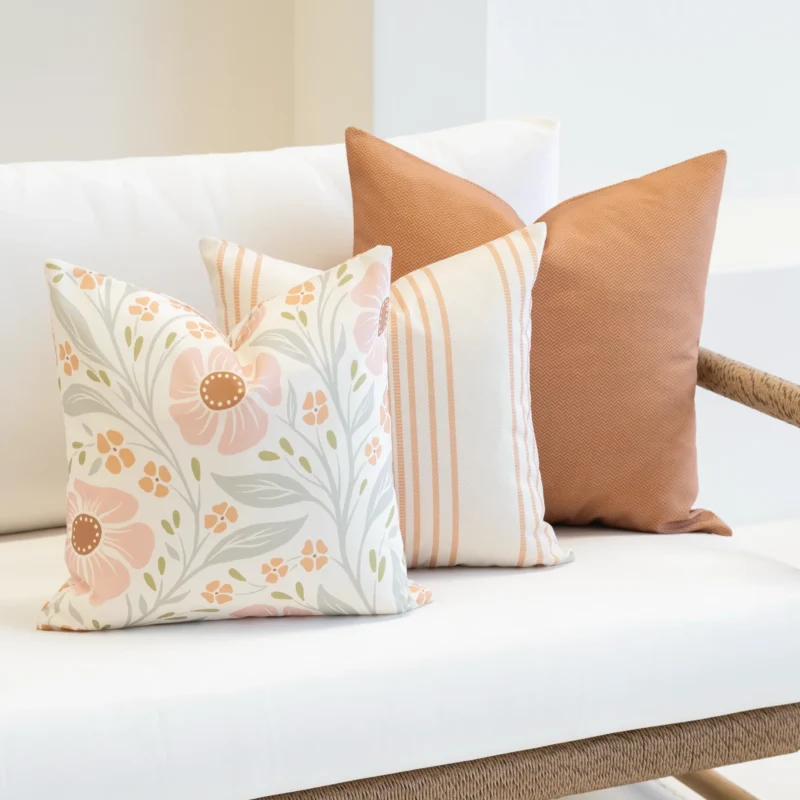 The Claybourne set is arranged in the corner of a white sofa.