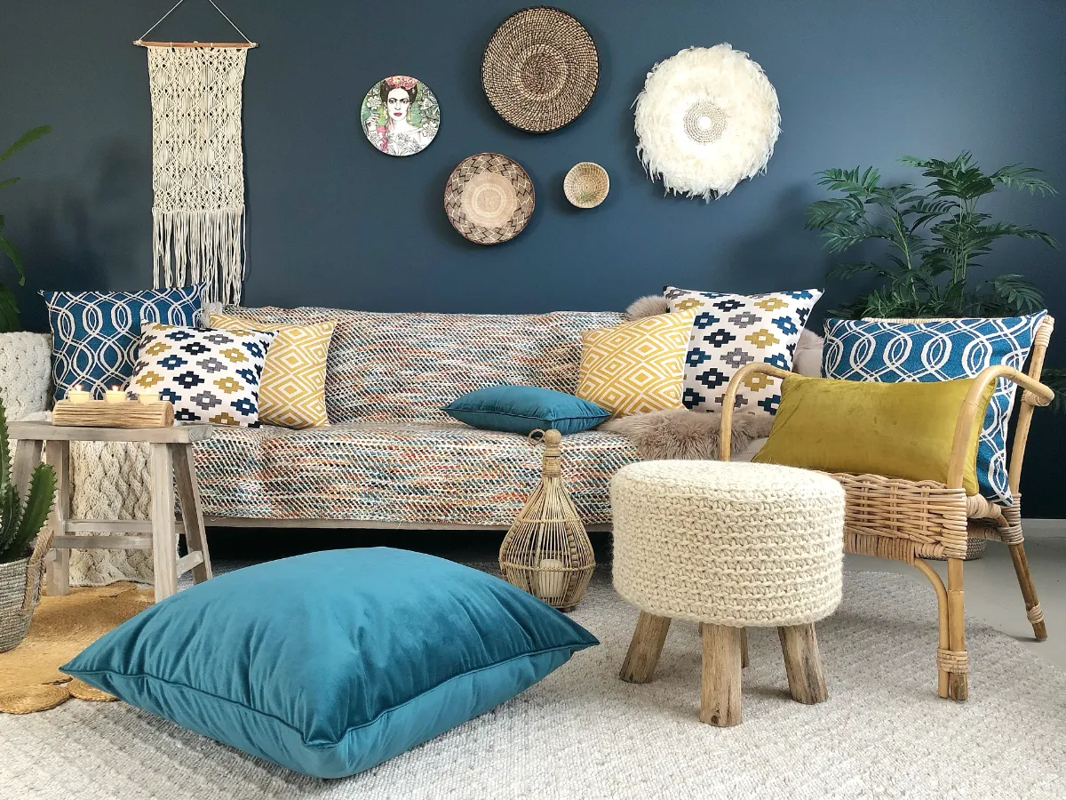 A colourful boho inspired room with various curios and collectables.