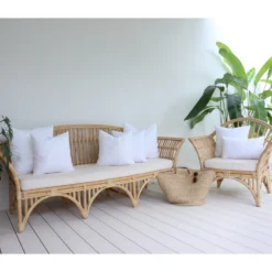 A set of 7 outdoor cushion inserts styled on a rattan seat.