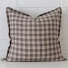 A superior designer cushion cover yielding a gingham style and in a classy large size.
