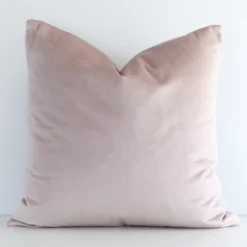 Striking square dusty pink cushion cover featuring a solid colour style on quality velvet fabric.