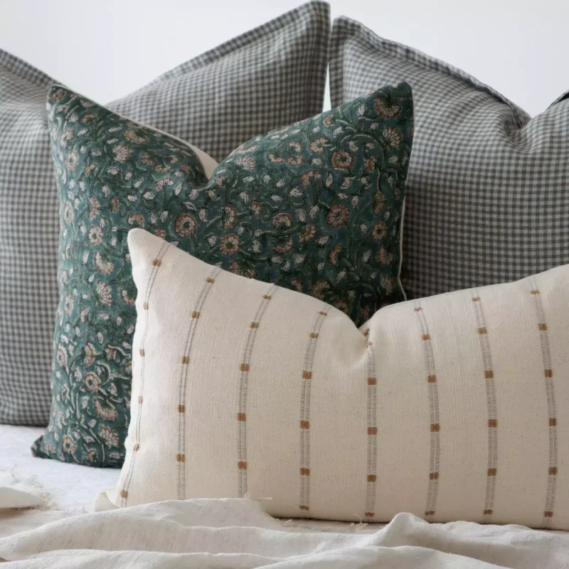 A close up shot showing the 4 designer cushions from Eden bed cushions set.