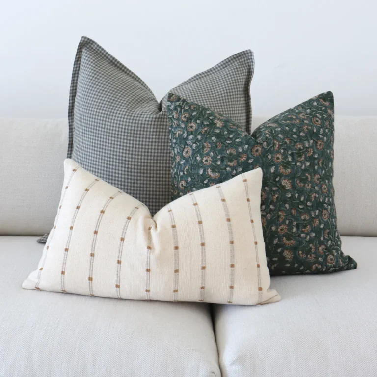 Close range image of 3 designer couch cushions from the Eden set.
