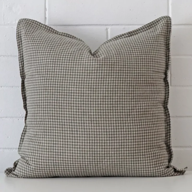 A bold gingham designer cushion in a sleek large size.