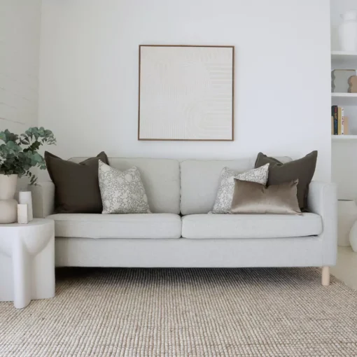 A white living room looks elegant with the Eliza sofa set of 5 cushions.