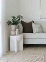 Cushions from the Eliza set of 5 sofa cushions are arranged carefully.