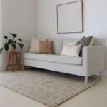 A light grey sofa's elegance is elevated by the Essa sofa cushions set, boasting five designer cushions.