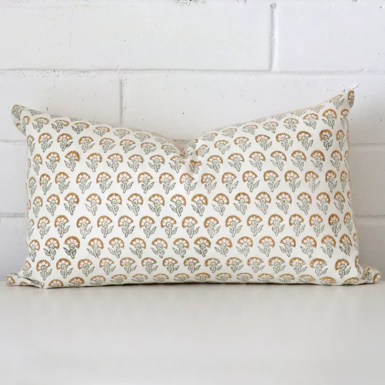 Gorgeous designer rectangle cushion in a COLOUR colour. It has a charming floral style.