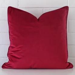 A stunning large velvet cushion in a fuchsia pink colour.