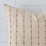 Close up image of top corner of this large striped cushion. This shows the designer fabric up close.