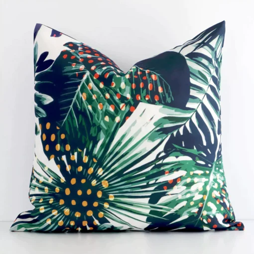 Gorgeous square outdoor cushion cover that has a graceful tropical design.