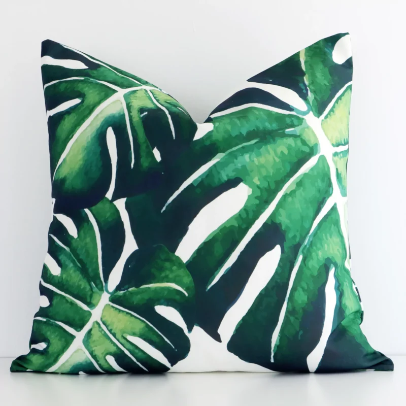 jungle-monstera-waterproof-outdoor-cushion-cover---sc549-45 Front view of a square tropical leaf printed cushion. Crafted from a special outdoor material.